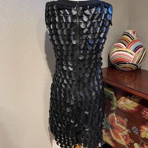 Stunning black faux leather Muse party dress from Neiman Marcus. Size 4…New